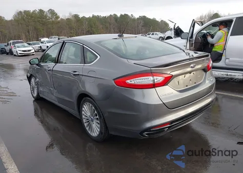 2014 Ford Fusion Titanium z USA, uszkodzony, nr VIN 3FA6P0D96ER281443